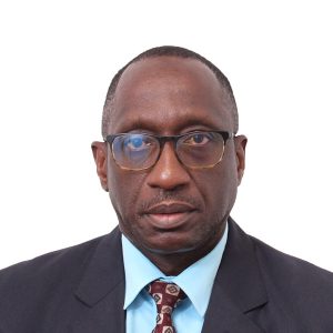 headshot of Dr Mervin E. Chisholm